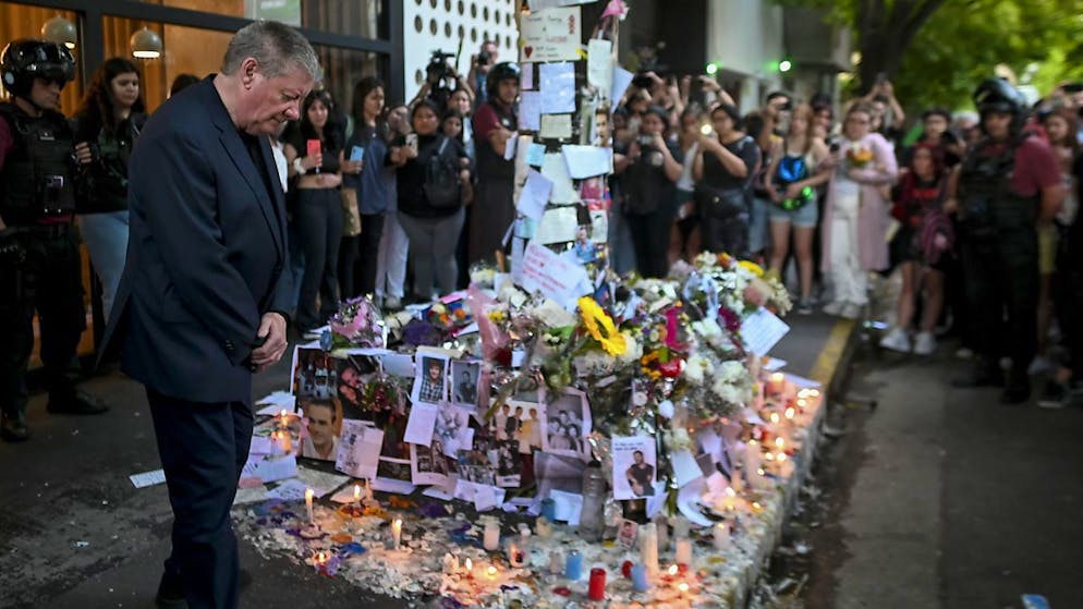 Geoff Payne is his hotel in Buenos Aires, where Sohn Liam keeps quiet about his balcony war.