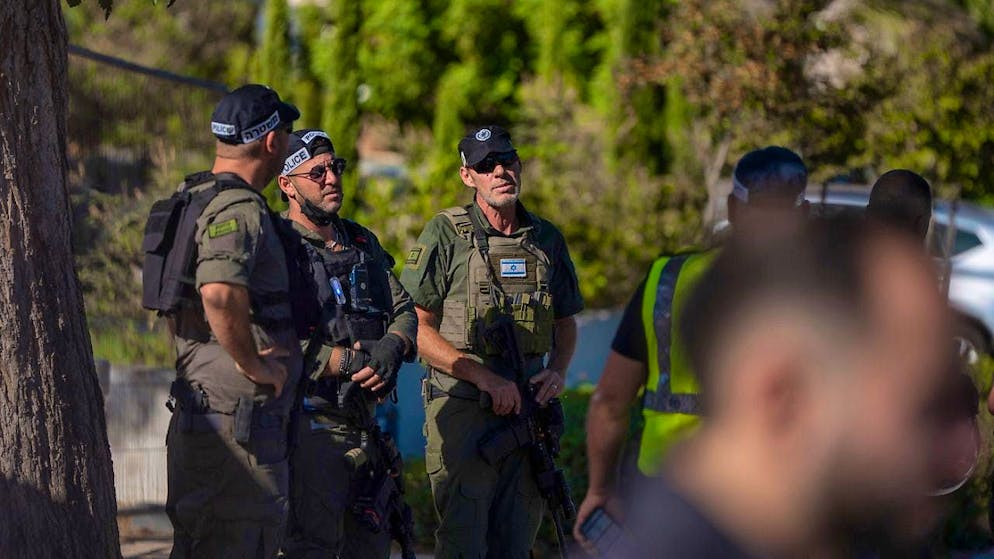 Israeli security forces stand guard at the site of a drone attack. A drone attack by Hezbollah from Lebanon on the Israeli city of Caesarea was aimed at Prime Minister Benjamin Netanyahu, according to government sources. Photo: Ilia Yefimovich/dpa
