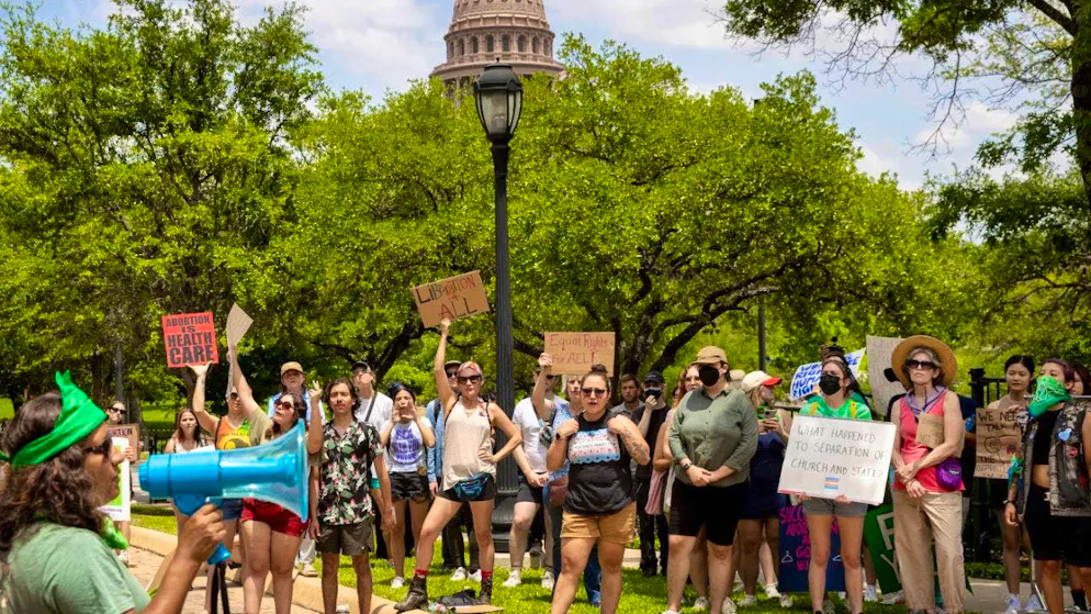 Protesters stand up for abortion rights.