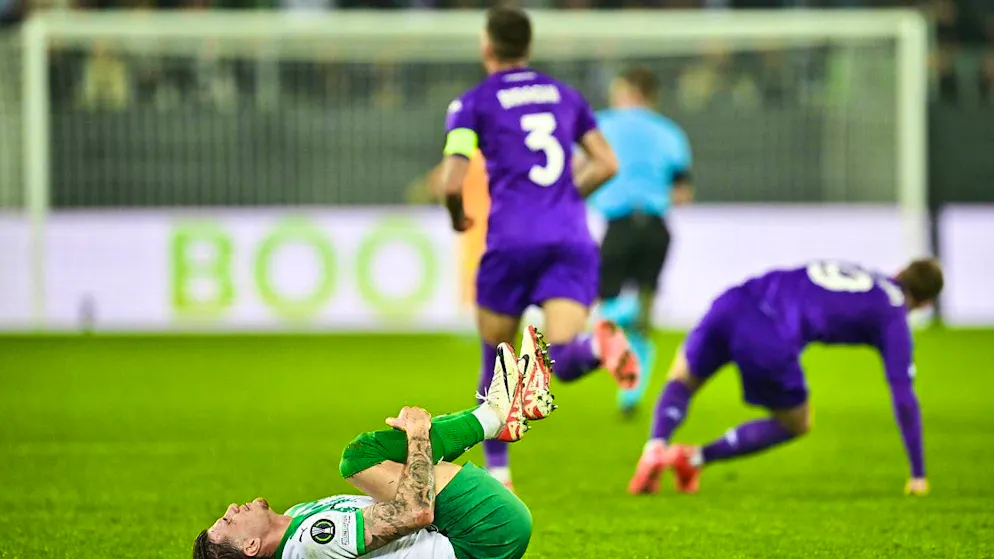 St. Gallen's Hugo Vandermersch lies on the ground as Fiorentina make it 3:2