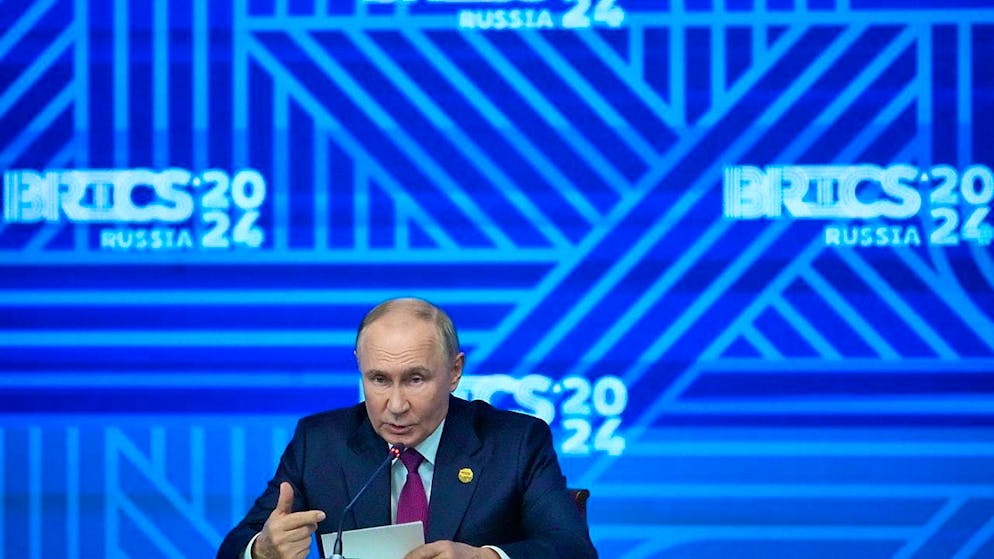 Vladimir Putin speaks at a press conference in Kazan. Photo: Alexander Zemlianichenko/AP/dpa
