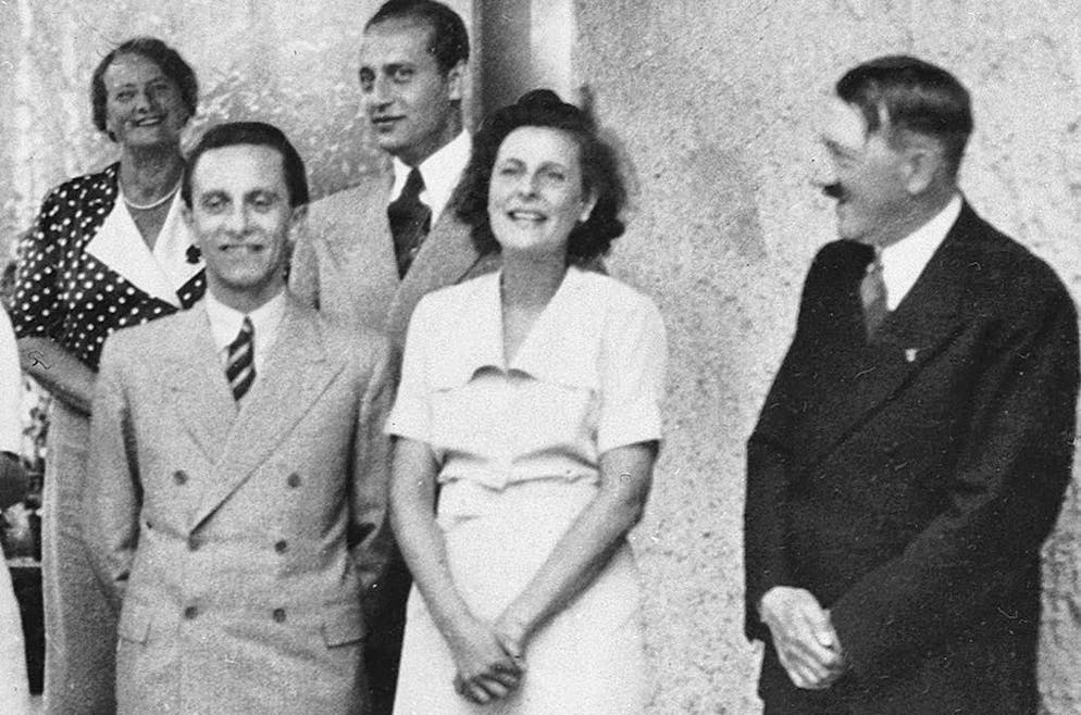 Front from left to right: Propaganda Minister Joseph Goebbels, Leni Riefenstahl and Adolf Hitler on March 10, 1938 in Riefenstahl's house in Berlin.