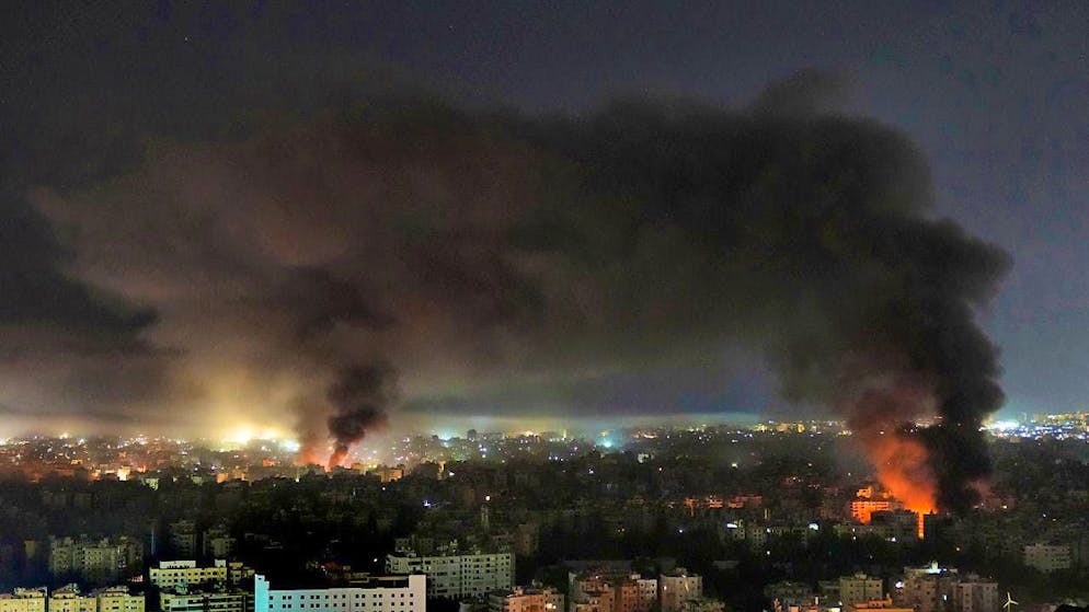 Flames and smoke rise after Israeli air strikes in a southern suburb of Beirut. Photo: Hussein Malla/AP/dpa