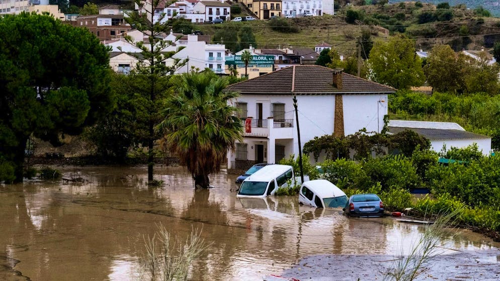 Cars washed away and derailed express train in Spain - Gallery. In Álora, not far from Málaga, where these cars were also damaged, an express train came off the tracks.