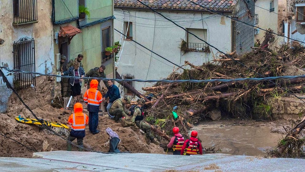 Rescue services are on duty after the river in Letur, Albacete, burst its banks due to heavy rainfall.