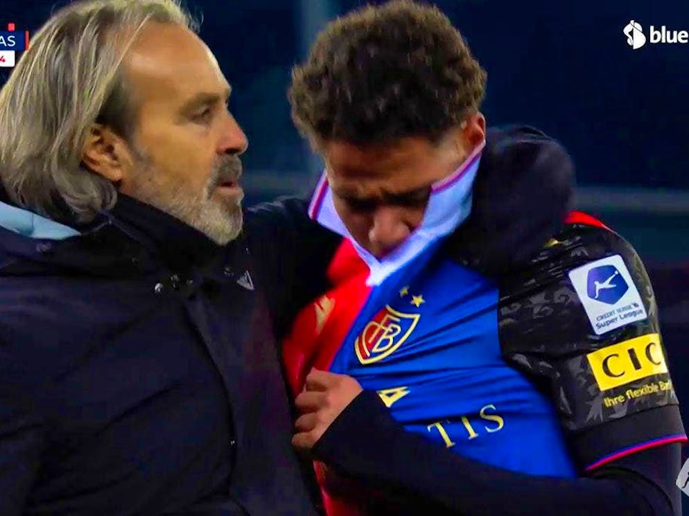 The football-mad Beney family. The then assistant coach Martin Rueda comforts the completely distraught Beney.