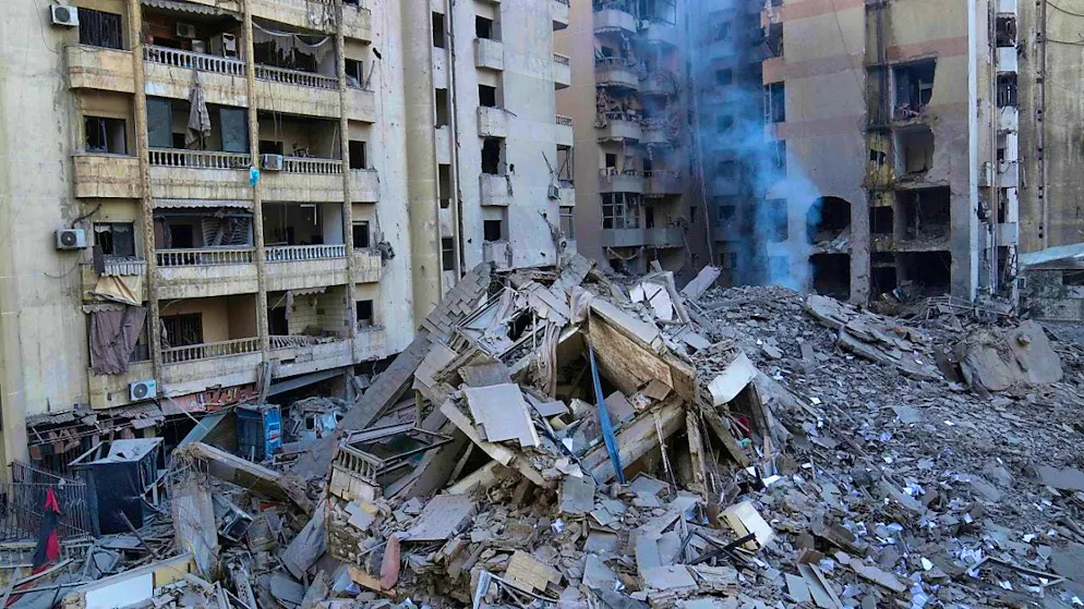 Smoke rises from a destroyed building hit by an Israeli airstrike on Dahiyeh, a southern suburb of Beirut. Photo: Hussein Malla/AP