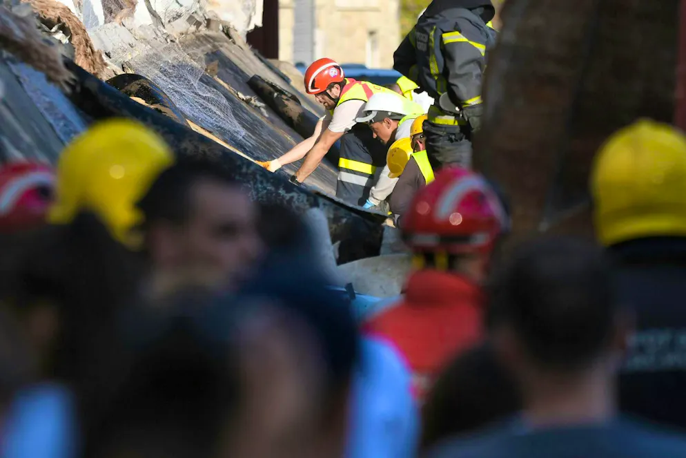 More dead after station canopy collapses in Serbia - Gallery. Rescue teams search for survivors under the collapsed station canopy in Novi Sad. 