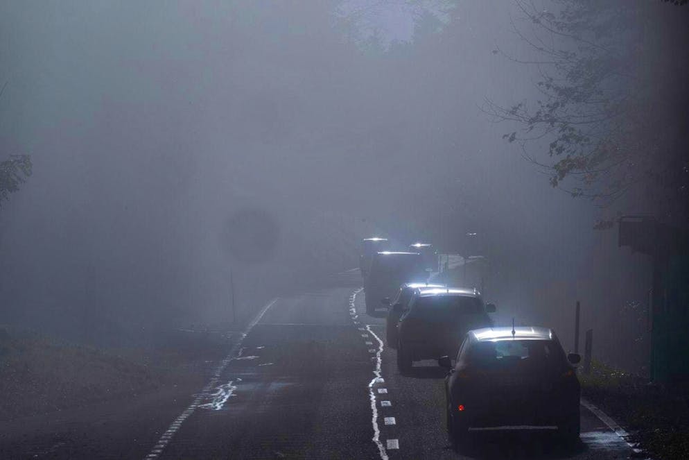 Cars disappear in the fog on the Gurnigel Pass on Sunday, November 3.