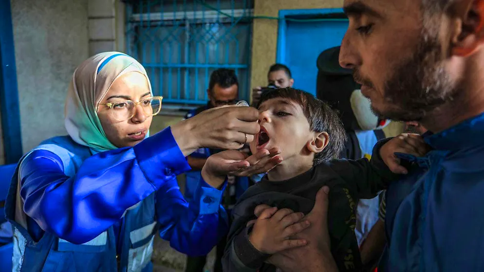 ARCHIVE - Palestinian children receive polio vaccine drops as part of the second polio vaccination campaign in Deir El-Balah in the central Gaza Strip. Photo: Abed Rahim Khatib/dpa
