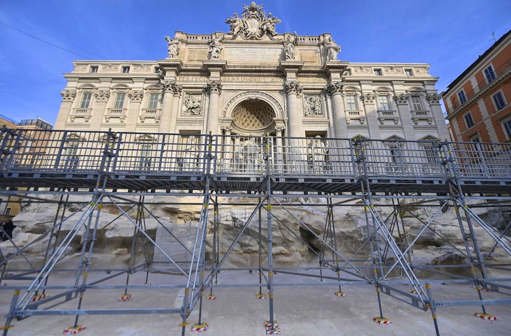 epa11711322 The empty Trevi Fountain during maintenance work, in Rome, Italy, 09 November 2024. The new walkway will allow tourists to visit the 18th century fountain during renovation works in preparation of the Jubilee, or Holy Year, 2025. EPA/RICCARDO ANTIMIANI