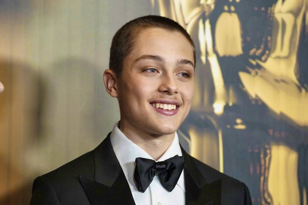 Angelina Jolie on the red carpet with son Knox. Jolie's son, who comes from her relationship with Brad Pitt, has grown up - and looks just like his father.