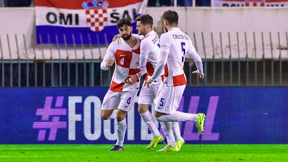 Josko Gvardiol (left) secures Croatia the point they needed in Portugal