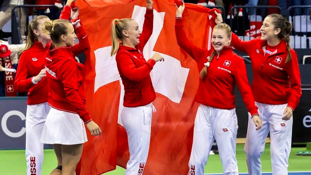 Beaming faces after a strong team performance.