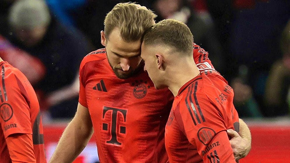 Harry Kane (left) celebrates the 1-0 lead with Joshua Kimmich.