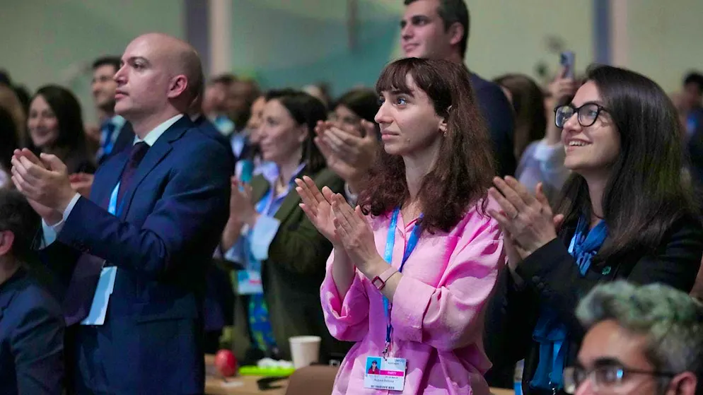Delegates applaud the agreement on a deal to curb climate change at the UN Climate Summit COP29 in Baku, Azerbaijan. Photo: Joshua A. Bickel/AP/dpa