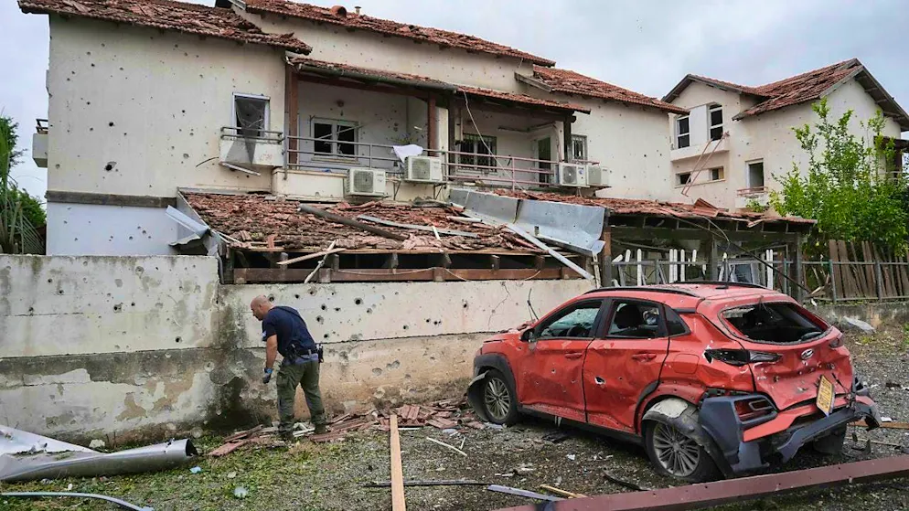 A rocket fired from Lebanon has hit Petach Tikva near Tel Aviv Photo: Oded Balilty/AP
