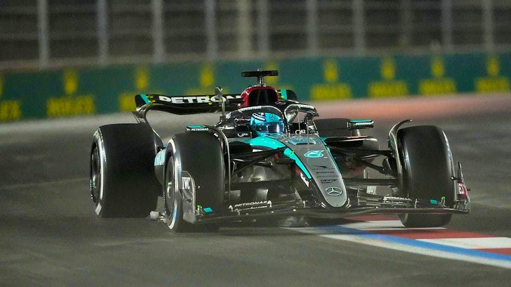 World Championship title for Max Verstappen - race win secured by George Russell - Gallery. George Russell dominates the race and celebrates a one-two Mercedes victory ahead of Lewis Hamilton.