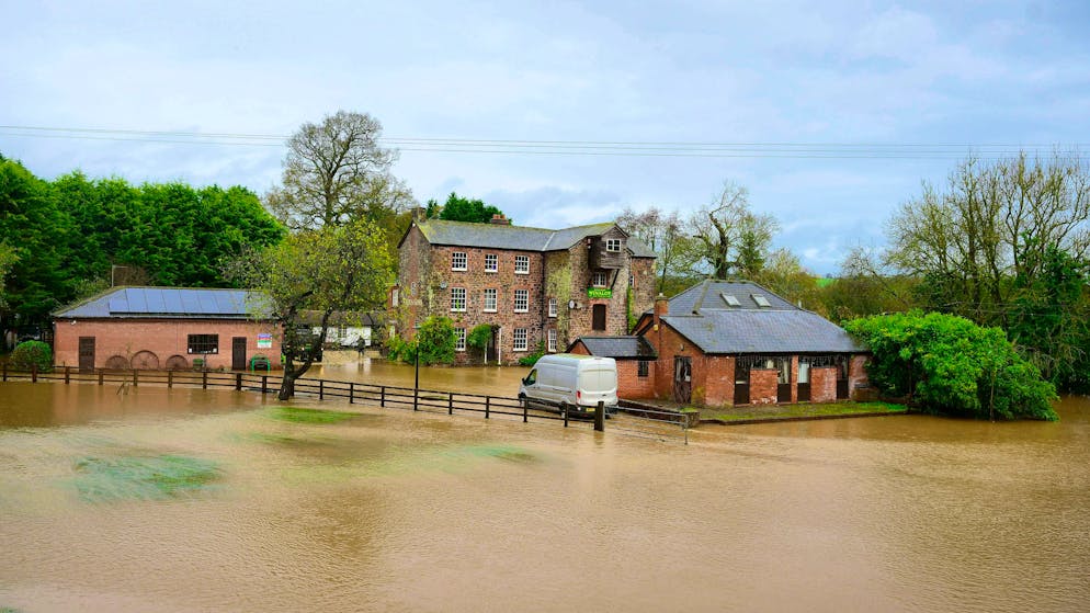 Several dead in storms in Great Britain - Gallery. Storm Bert has caused the River Exe in Devon to burst its banks.