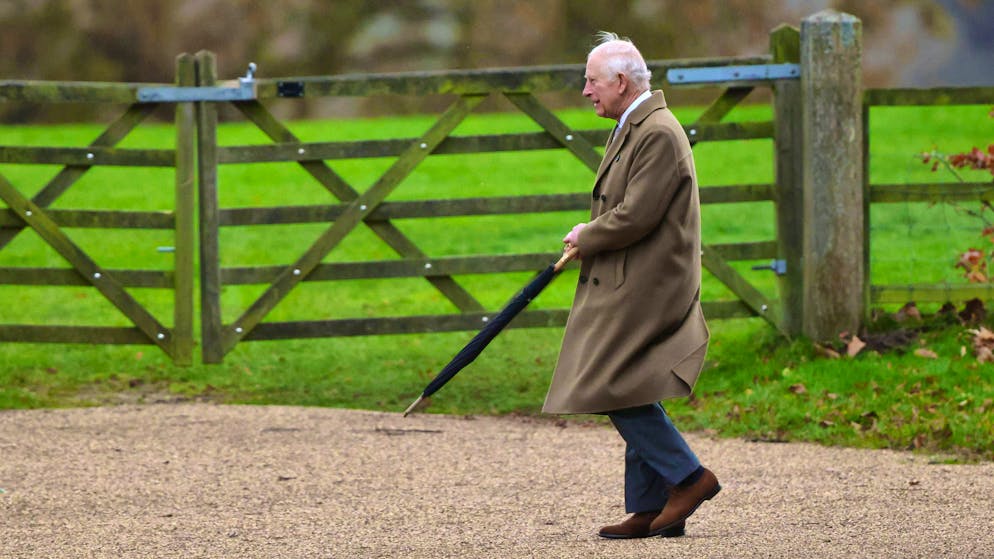 Several dead in storms in Great Britain - Gallery. Bert ruffles the hair of King Charles III as he goes to church in Sandringham on Sunday morning.
