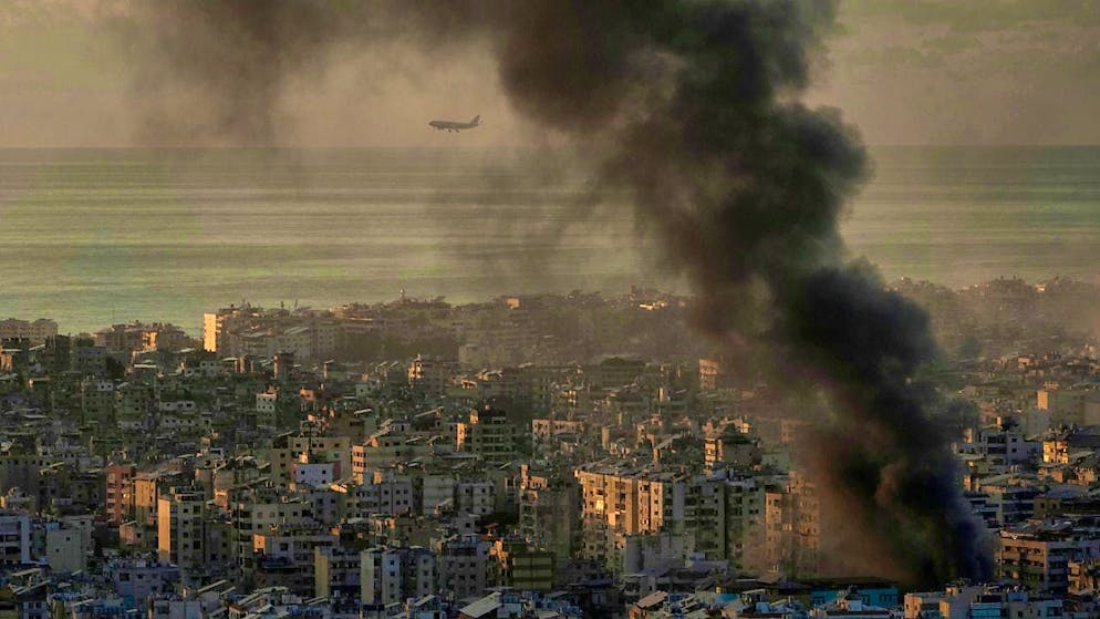 Smoke from Israeli airstrikes rises in Beirut. Photo: Bilal Hussein/AP