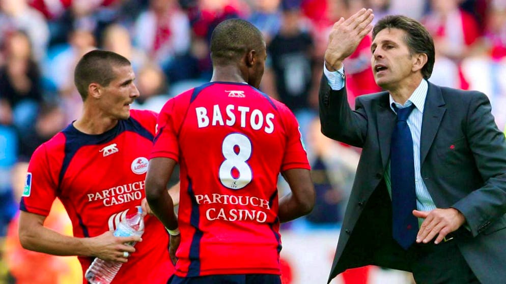 Grégory Tafforeau (left) tells an anecdote about coach Claude Puel (right).