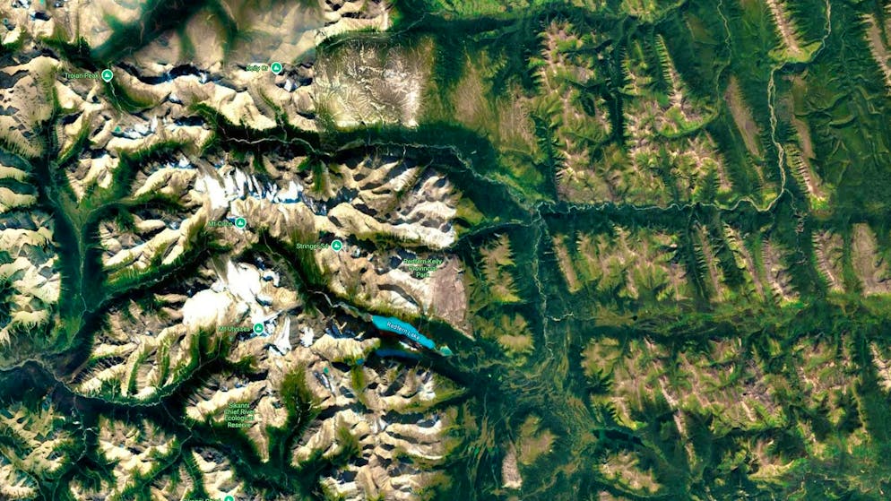 Near Redfern Lake in British Columbia, the missing hiker is able to attract the attention of two workers and is rescued after weeks in sub-zero temperatures.