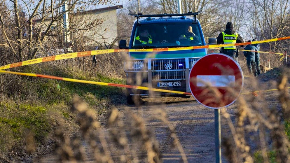 A cordoned-off road after the crash site of the DHL cargo plane near Vilnius on November 26.