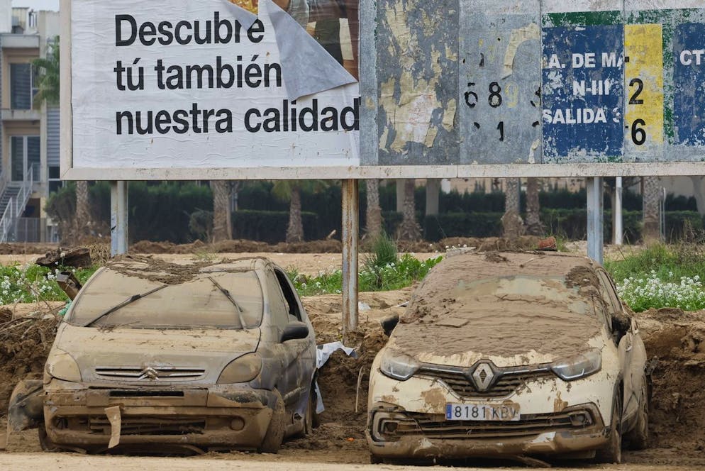 epa11739492 Destroyed cars covered with mud following the floods in the town of Massanassa, Valencia, eastern Spain, 25 November 2024. Floods triggered by the DANA (high-altitude isolated depression) weather phenomenon hit the east of the country on 29 October 2024, devastating Valencia and neighboring provinces and leaving at least 229 people dead. EPA/JOSE MANUEL VIDAL