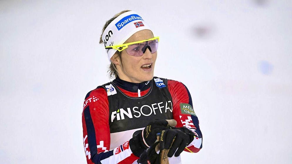 Therese Johaug: A look at the clock after crossing the finish line