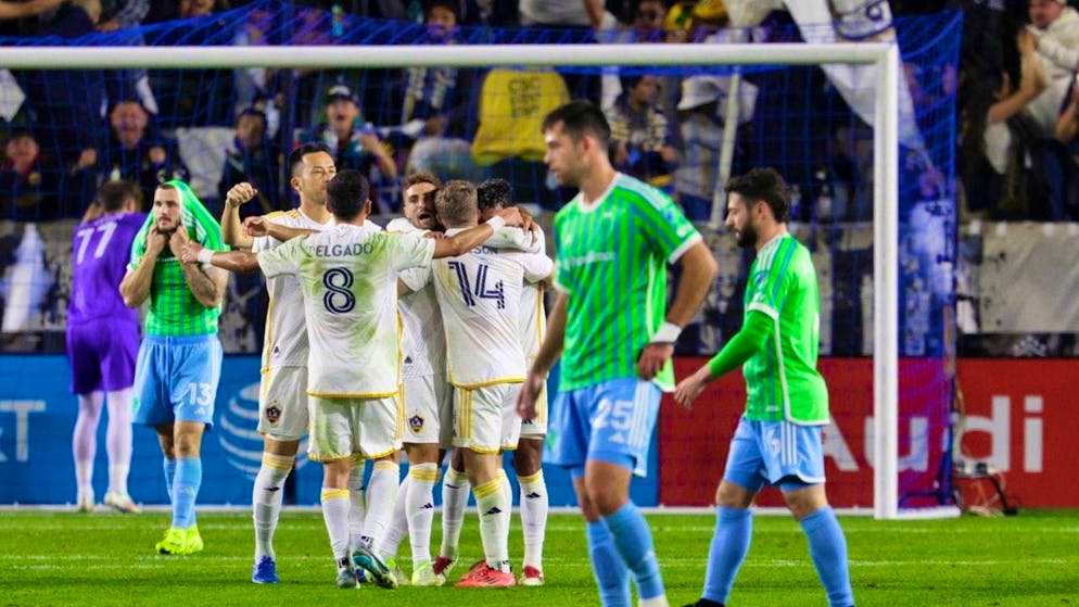 The LA Galaxy players celebrate reaching the Major League Soccer play-off final