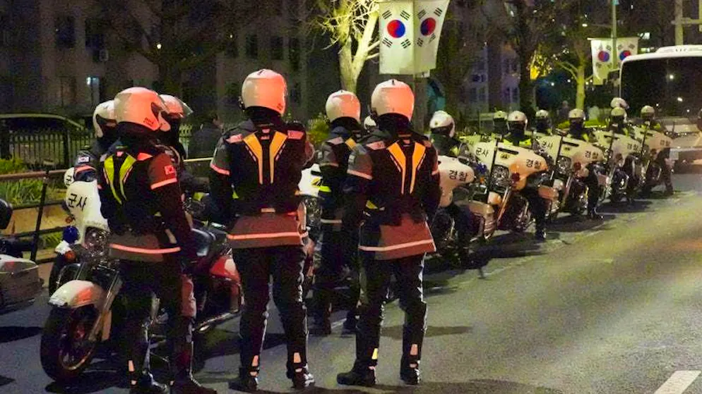 Military police motorcyclists stand in front of the National Assembly. The President of South Korea had declared martial law. In a speech broadcast live, he accused the country's opposition of sympathizing with North Korea.