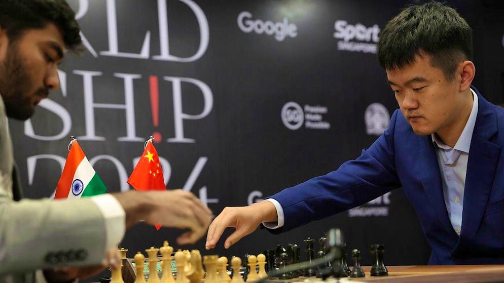 Dommaraju Gukesh (left) opens the seventh game