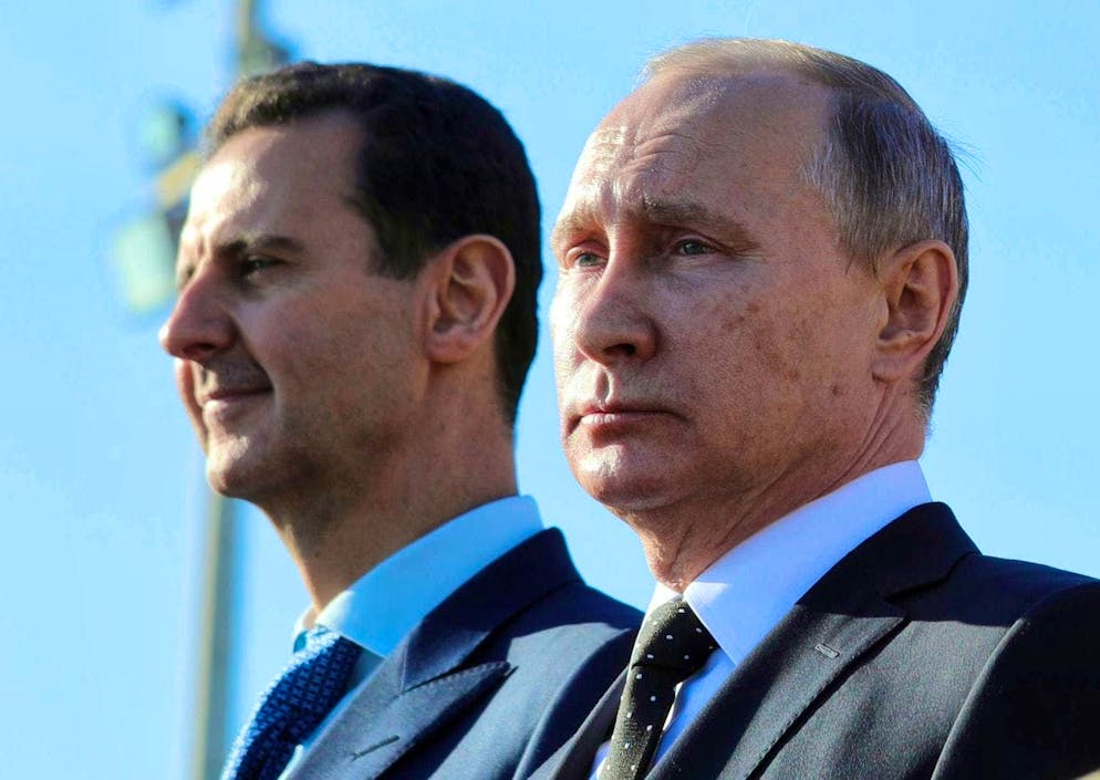 Il presidente russo Vladimir Putin, a destra, e il presidente siriano Bashar Assad.