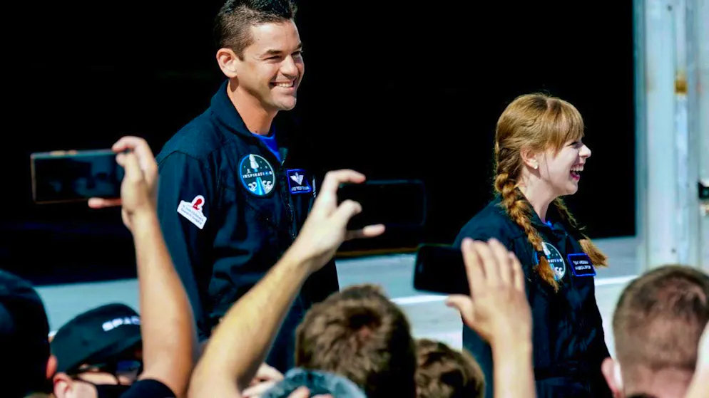 ARCHIVE - Jared Isaacman and Hayley Arceneaux prepare for a flight into space. Photo: John Raoux/AP/dpa