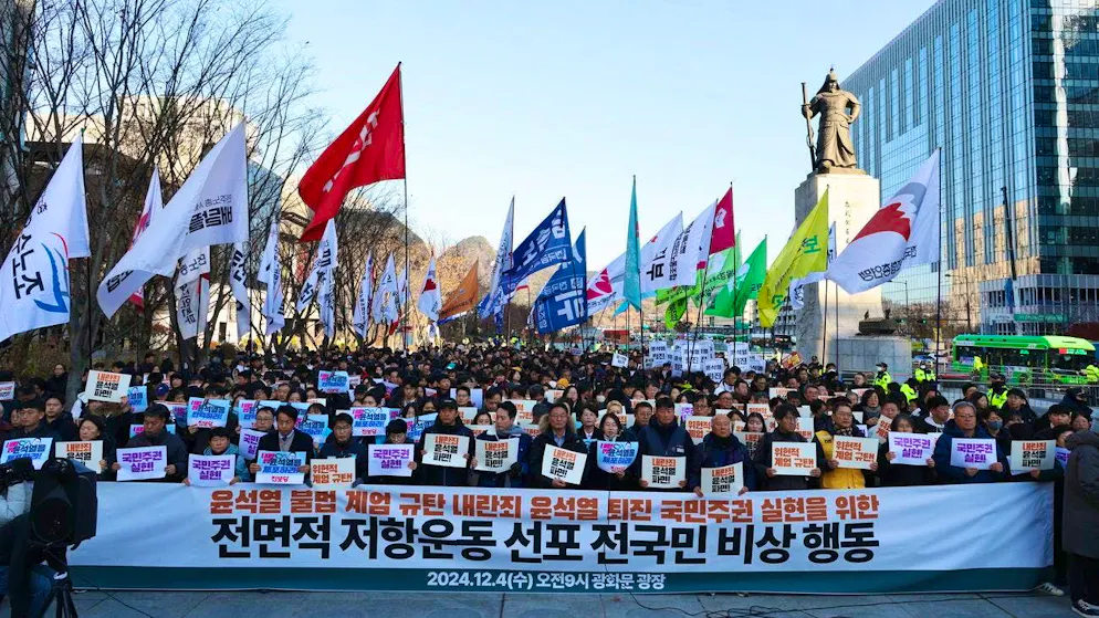 Protesters demonstrate in front of the National Assembly in Seoul on Wednesday for the removal and impeachment of President Yoon Suk Yeol.