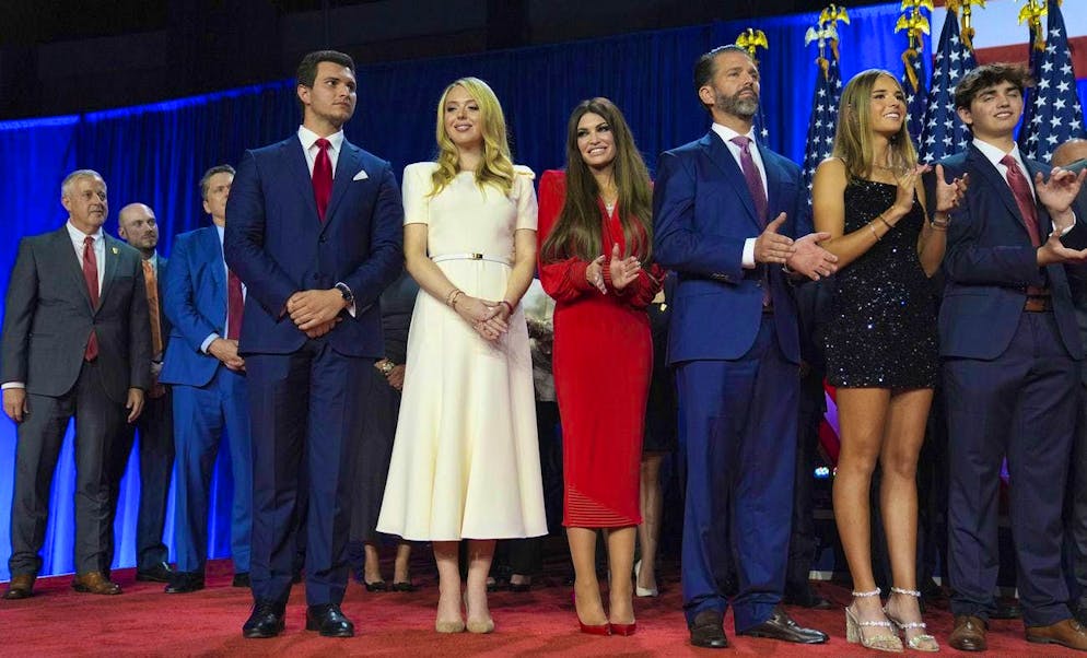 From left: Michael Boulos and his wife Tiffany Trump, Kimberly Guilfoyle, Donald Trump Jr, Kai Madison Trump and Donald Trump III during an election night party at the Palm Beach Convention Center, Nov. 6, 2024.