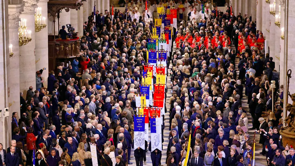 Notre-Dame reopens - with splendor and lots of emotion - Gallery. Church banners were also carried for the solemn ceremony.