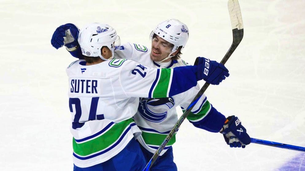 Pius Suter and his pass man Conor Garland celebrate the goal