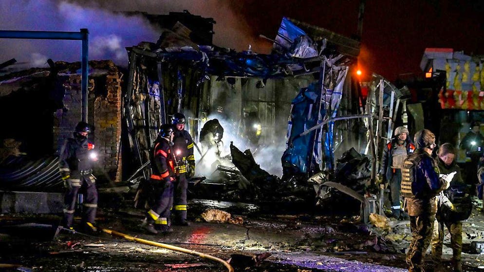 First responders deal with the consequences of a Russian airstrike in Zaporizhia in south-eastern Ukraine. Several people were killed in a Russian glide bomb attack in the southeastern Ukrainian city of Zaporizhia. Photo: -/Ukrinform/dpa