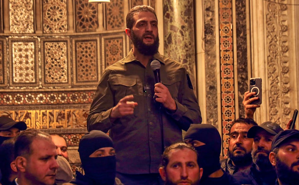 Abu Mohammed al-Julani speaks in the Umayyad Mosque in Damascus. Photo: Omar Albam/AP