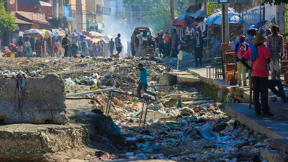 ARCHIVE - The majority of the victims were women and men over the age of 60, whose bodies were mutilated and burned in the streets. Photo: Odelyn Joseph/AP/dpa