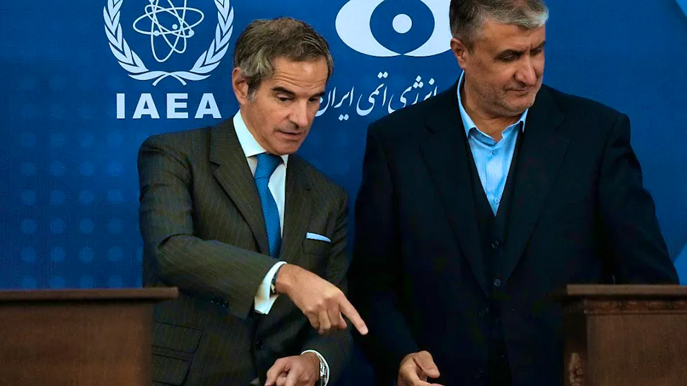 ARCHIVE - Rafael Mariano Grossi (l), Director General of the International Atomic Energy Agency (IAEA), gestures at the end of his joint press conference with Mohammad Eslami, Head of the Atomic Energy Organization of Iran. Photo: Vahid Salemi/AP/dpa