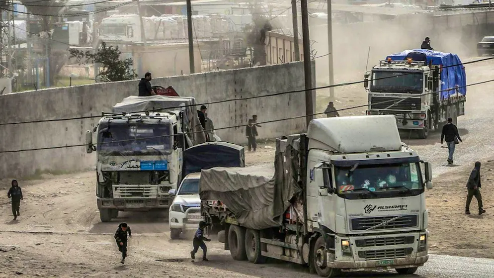 ARCHIVE - Trucks carrying aid enter the Gaza Strip via the Kerem Shalom border crossing. Photo: Abed Rahim Khatib/dpa