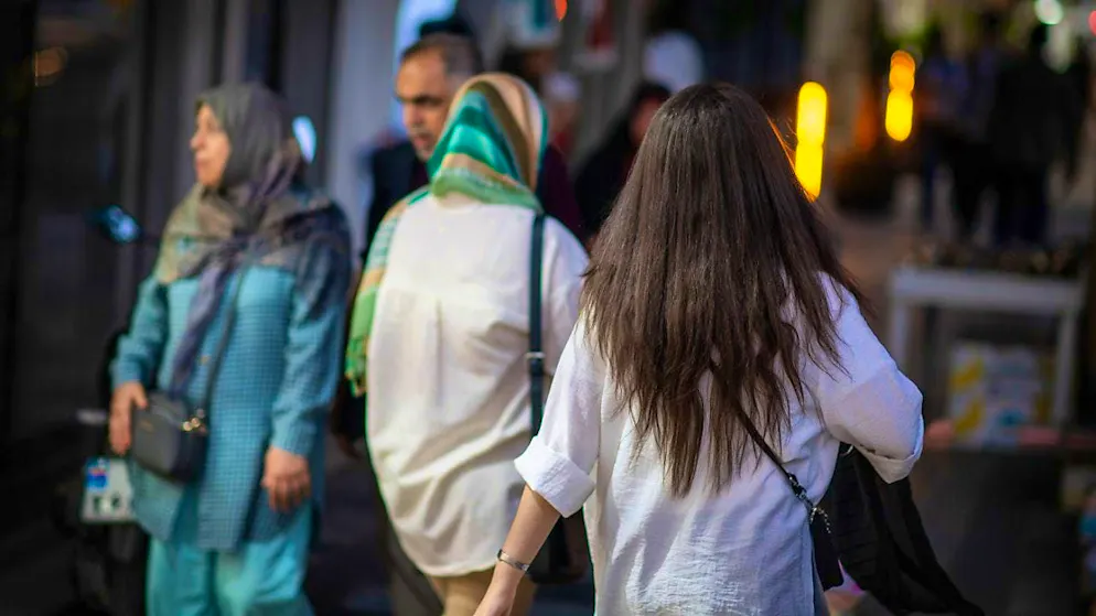 ARCHIVE - According to the latest version of the law, women who fail to comply with the headscarf requirement could face heavy fines or be denied public services. Photo: Arne Immanuel Bänsch/dpa