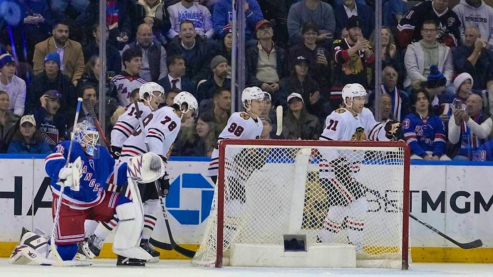 Taylor Hall (right) celebrates with his teammates after scoring a 2-1 goal against the New York Rangers