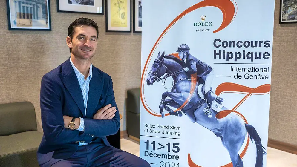 Steve Guerdat poses in front of the poster for the 63rd edition of the CHI Geneva