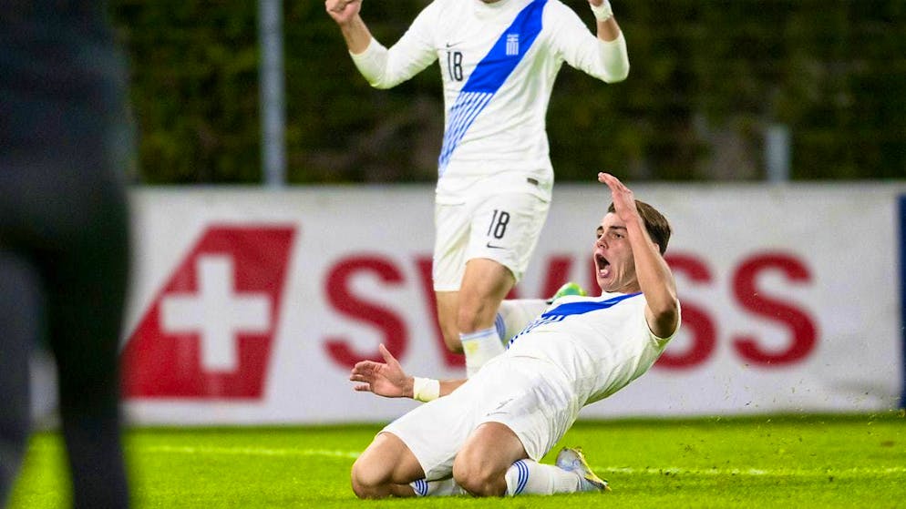 Lugano's new striker Georgios Koutsias (front) in celebratory pose