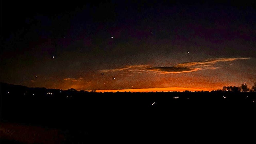 HANDOUT - This photo provided by Trisha Bushey shows the evening sky and points of light near Lebanon Township on Dec. 5, 2024. Photo: Trisha Bushey/Trisha Bushey/AP/dpa - ATTENTION: For editorial use only until Dec. 27, 2024 and only with full attribution to the above credit