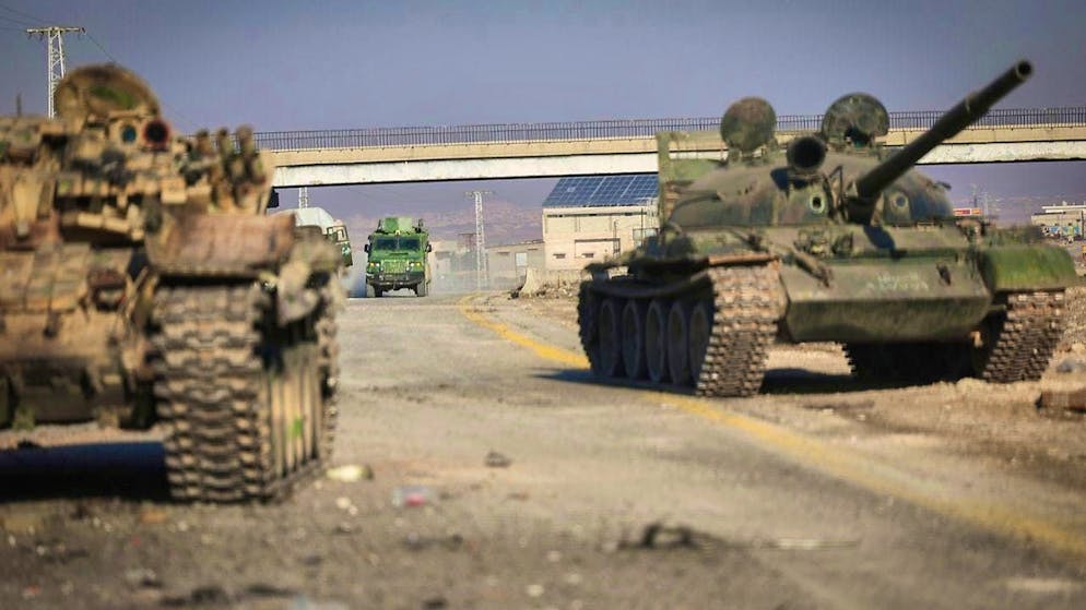 ARCHIVE - Abandoned armored vehicles of the Syrian army stand on a road. Photo: Ghaith Alsayed/AP/dpa
